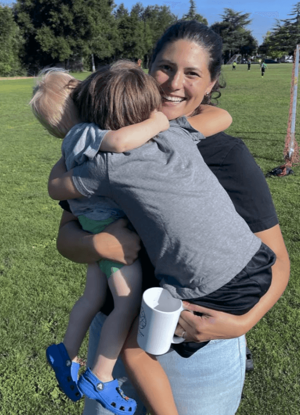 Family hug at the park